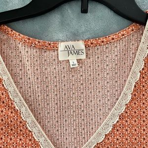 Ava James size large, sleeveless top with lace trim.